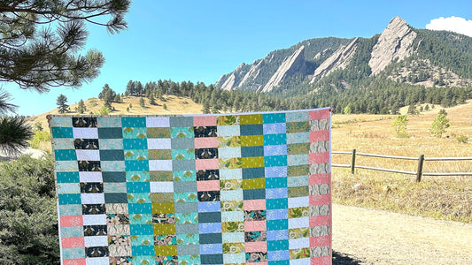 The Baseline Quilt in front of the Flatirons in Boulder Colorado